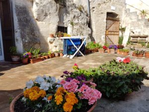 Puglia Italy tour landscape Matera sassi clothline flowers